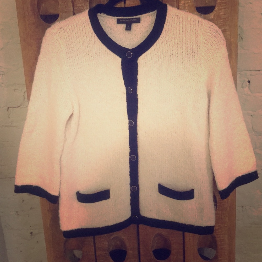 Sweater with black and gold buttons